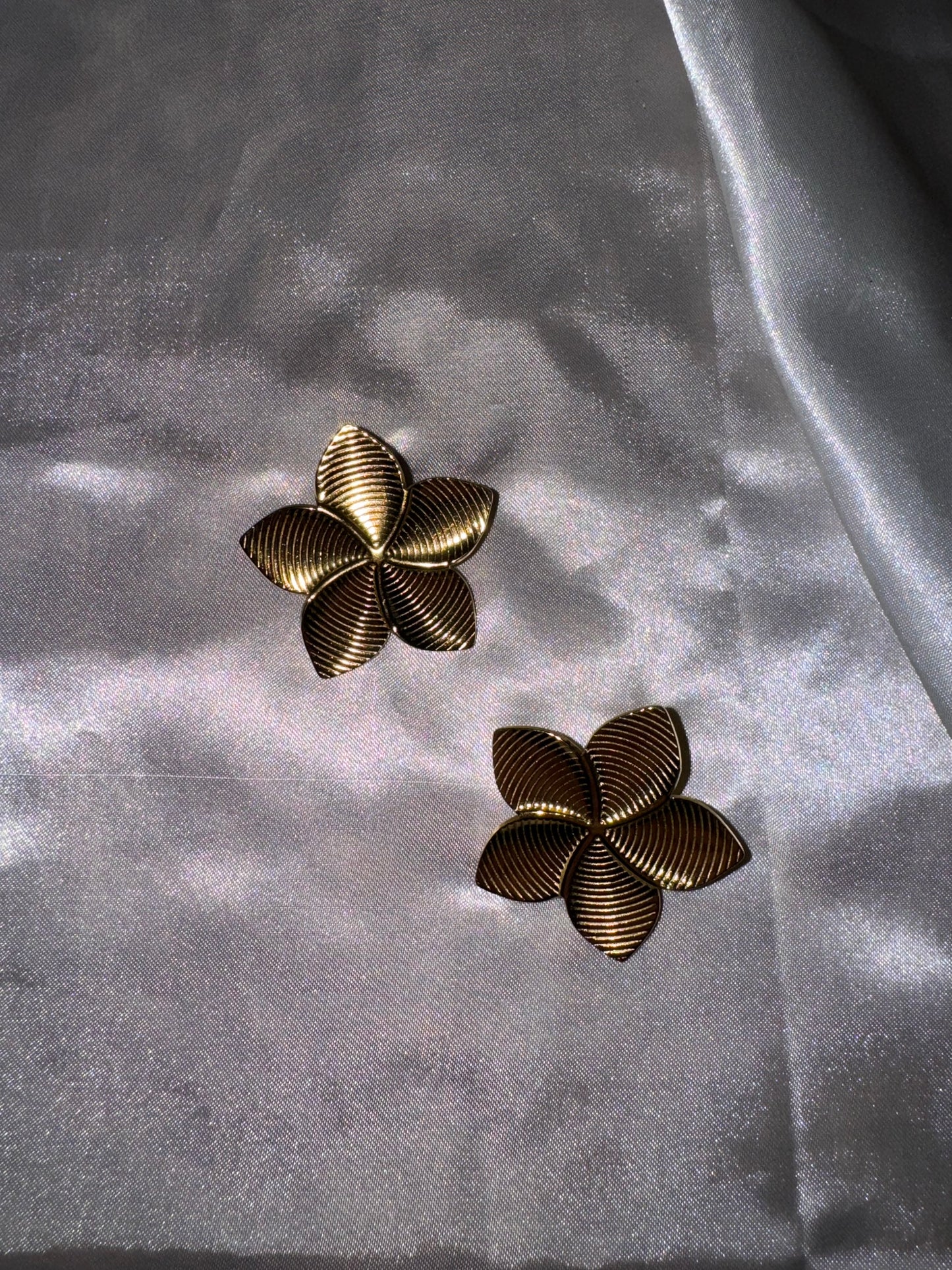 Boucle “fleur lignée”