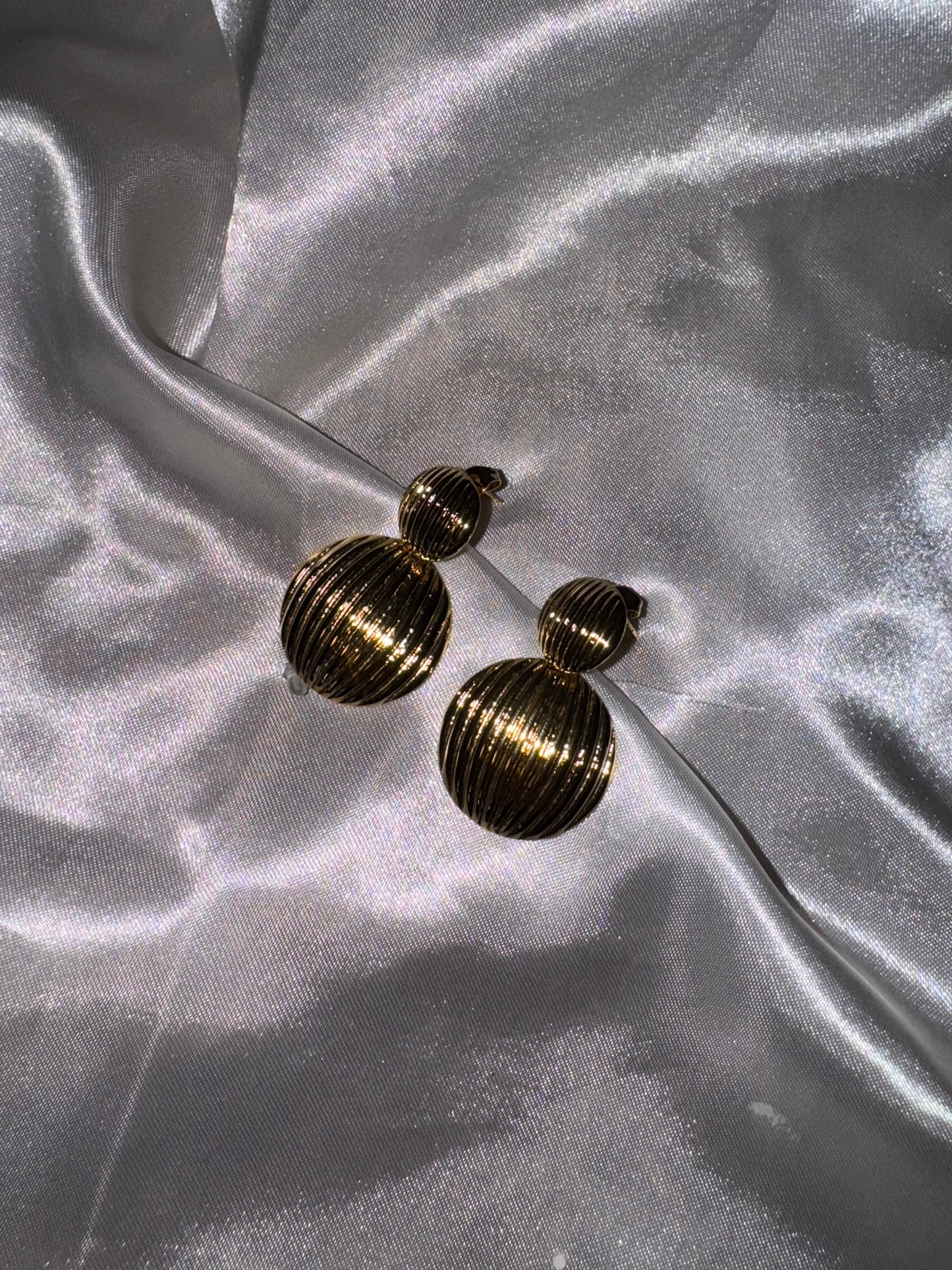 Boucle d’oreille « ramé »