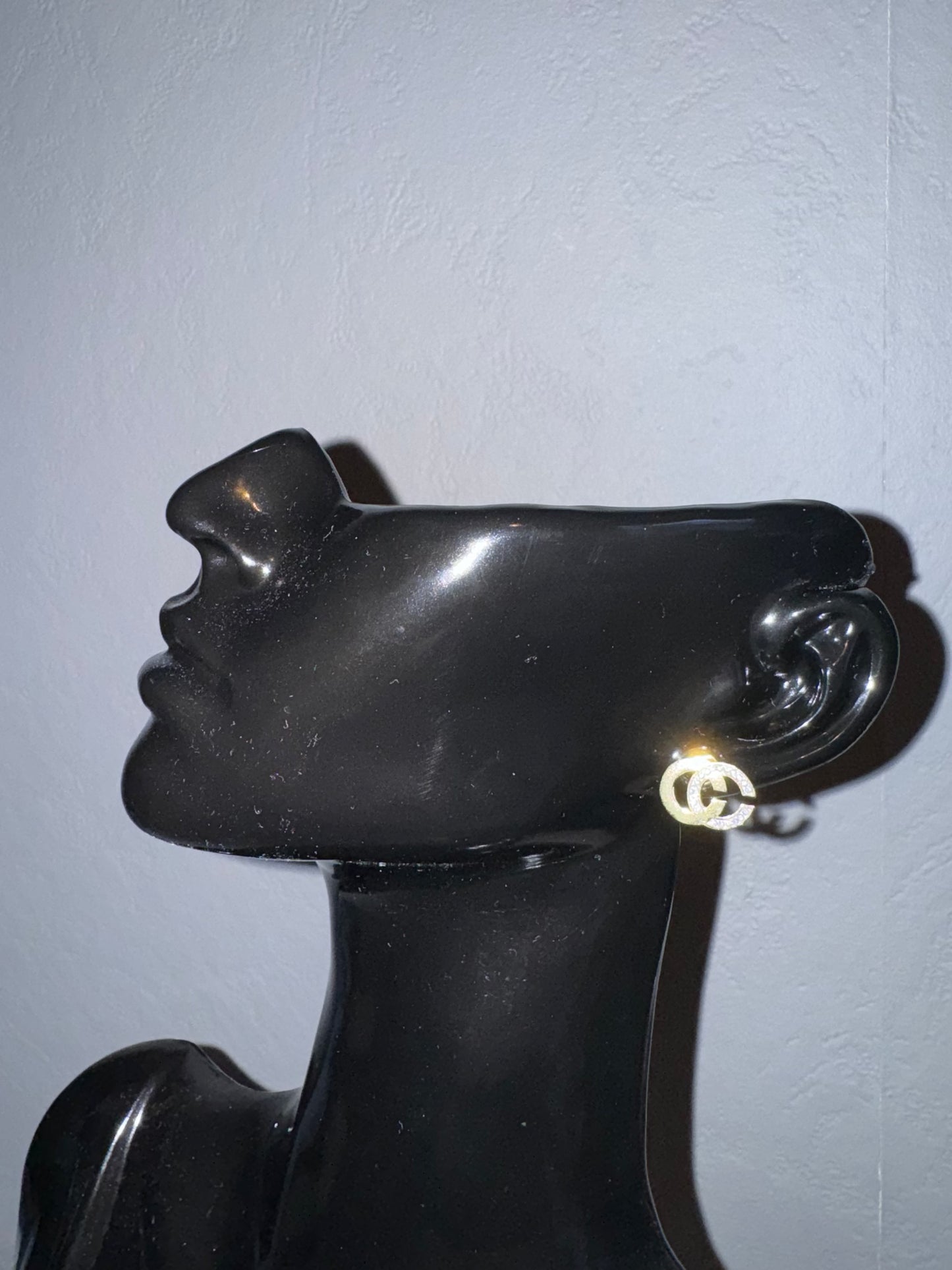 'G' earrings