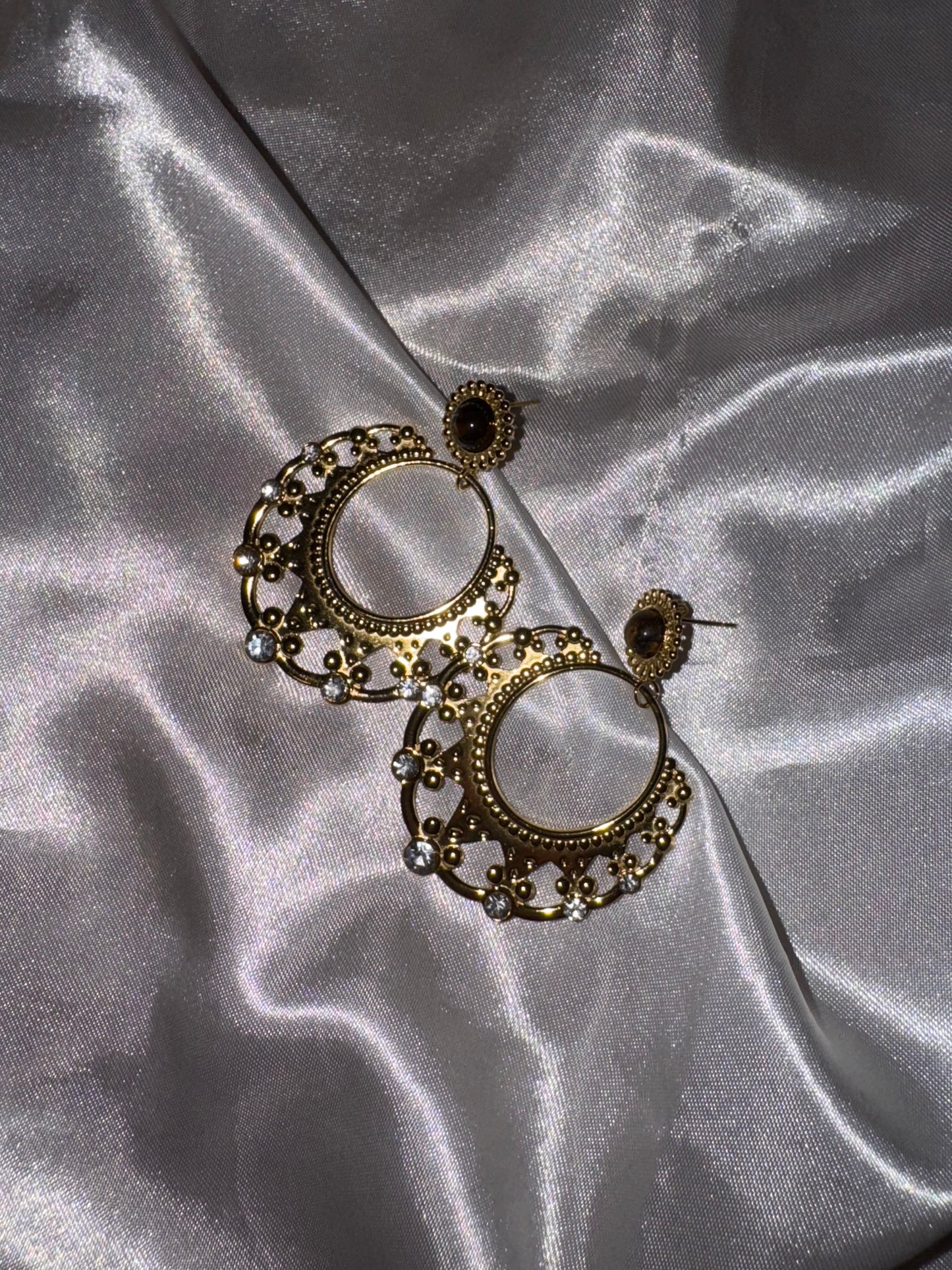 Boucle d’oreille « média »
